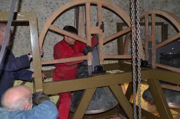 Wheel being fitted onto new bell